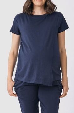 A petal-inspired silhouette allows for easy and discreet nursing in this short-sleeve top in a soft, stretchy knit. Crewneck Short sleeves 70% viscose, 25% cotton, 5% elastane Machine wash, tumble dry Imported Summer Cotton Tops Bump Friendly, Fitted Maternity Tops For Summer, Summer Fitted Bump Friendly Tops, Fitted Summer Maternity Tops, Stretch Modal Short Sleeve T-shirt, Stretch Modal T-shirt With Short Sleeves, Nursing Friendly Short Sleeve Maternity T-shirt, Casual Nursing Friendly Maternity Tops, Nursing Friendly Maternity Top With Crew Neck