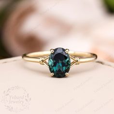 "Please confirm your US size when you make an order) Jewelry Details Gold Type : Solid 14K Gold / Solid 18K Gold / Platinum (Choose One in Material Option) Center Stone: Natural Blue Green Sapphire, Approximately 1.5ct Stone Size: 6*8mm Cut: Oval Cut Band Width: Approximately 1.5mm SKU: YR1043 ~*-*~Purchase Guarantee: - All our jewelry is handmade, and each process is refined. - 14 Day Refund Guarantee. - All our products are Free Shipping. - Free Gift Box&Packing. ~*-*~Please contact us if you need service: 1. Ring Resizing. 2. Metal Change(PT950/10k/14k/18k White/Yellow/Rose Gold). 3. Engraving ring (less than 10 letter). 4. Accept customization. We believe that our quality, attention to detail, design and customer service make us stand out from the competition. If you have any questions Oval Gemstone Ring, Wedding Rings Green, Sapphire Engagement Ring Unique, Blue Green Sapphire Ring, Teal Sapphire Engagement Ring, Green Sapphire Engagement Ring, Green Sapphire Ring, Blue Green Sapphires, Engagement Ring Unique