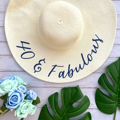 "This listing is for one custom floppy hat with your choice of hat color, text color, and phrase. If not specified, the default text for personalized hats is \"40 & Fabulous\". The hat is also available without personalization/text. No props are included. PRODUCT DETAILS: - Paper/straw floppy hat with iron on glitter vinyl (not embroidered) - One size fits most; includes an elastic strap for securing the hat - Hat measures 18 inches across, 7.75 inch crown/hat opening; 5.25 inch brim (wired Customizable Curved Brim Summer Hats, Summer Letter Print Hat For Gift, Curved Brim Hats For Birthday In Spring, Curved Brim Hats For Spring Birthday, Summer Hats With Letter Print For Gifts, Spring Curved Brim Hat For Birthdays, Personalized Summer Hats With Curved Brim, Customizable Curved Brim Hat For Vacation, Summer Brimmed Hats For Birthdays