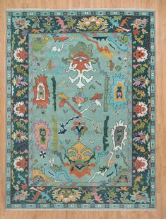 a blue rug with many different designs on it