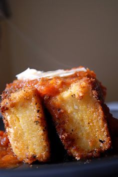 two pieces of cake sitting on top of a plate