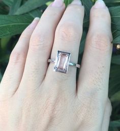 "A stunning north south setting featuring a rectangle shaped genuine flawless Morganite from Brazil is bezel set with a polish finish makes a lovely engagement/promise/statement ring. Wrapped in a box ready for gift-giving. Morganite measure 9.5mm x 6mm ---> Don't know your ring size? Purchase our ring sizing gauge https://www.etsy.com/listing/290720637/ring-sizer-ring-sizing-gauge-multisizer?ga_search_query=ring+sizer&ref=shop_items_search_1 *Follow us @belesasjewelry on Instagram for pr Modern Ring With Rectangular Accent Stones, Modern Rings With Rectangular Accent Stones, Modern Jewelry With Rectangular Accent Stones, Modern Rectangular Rings With Accent Stones, Formal Birthstone Ring With Rectangular Stone, Rectangular White Gold Ring With Accent Stones, Modern Sterling Silver Rings With Rectangular Stone, Modern Rectangular Ring For Anniversary, Modern Rectangular Gemstone Ring