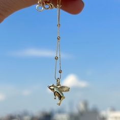 "FLYING PIG NECKLACE Fan of animals? this adorable flying pig necklace is for you. MATERIALS: -18k Gold Filled Charm  -18k Gold Filled Satélite Chain -18k Gold Filled Lobster Closure  -Lead & Nickel FREE SIZE: -16\" inch + 1 inch extensor Chain Style: -18k Gold Filled Satelite Chain  PACKAGING: -Black Velvet Bag -Jewelry Care Card -Personalized Gift Note (Optional)  JEWELRY CARE  -Allow perfumes and lotion dry before wearing -Remove before showering -Remove when working out -Store in a close bag or box FREE SHIPPING NOTE: THE PRICE SHOWN IS FOR ONE ITEM, Layering pieces shown maybe purchased separately." Jewelry Valentines Day, Pig Necklace, Pig Jewelry, Snake Ears, Animal Necklace, Bag Jewelry, Flying Pig, Pet Necklace, Care Card