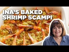 a woman standing in front of a bowl of shrimp and cauliflower casserole