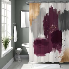 a bathroom with a shower curtain that has some paint splatters on it