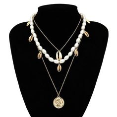 FREE SHIPPING ON ALL ORDERS OVER $50 | 100% SATISFACTION GUARANTEED Click "ADD TO CART" To Get Yours Now | Up To 60% OFF ✨ This choker necklace is exquisitely designed for fashion and comfort. With its multiple-layered design, the Arimonz lariat style choker necklace is very appealing with its three different types of gemstones with elegance and style. Features: 📌 Lightweight: 32.6g or 0.07lbs📌 Made With Alloy, Pearl, and Crystal📌 100% Satisfaction Guaranteed It has a lightweight and fashiona Shell Choker, Layered Choker Necklace, Layered Chokers, Multi Layer Necklace, Pearl Choker Necklace, Long Chain Necklace, Pearl Choker, Crystal Necklace Pendant, Anniversary Party