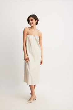 Linen Blend Tie Strap Midi Dress Spring Maxi Dress With Tie Back And Straight Neckline, Spring Dresses With Spaghetti Tie Straps, Spring Dresses With Spaghetti And Tie Straps, Midi Dress With Adjustable Straps For Brunch, Sundress With Adjustable Straps And Straight Neckline For Daywear, Casual Tie Back Midi Length Slip Dress, Tie Back Midi Length Slip Dress For Casual Wear, Midi Length Dress With Adjustable Straps For Daywear, Beach Midi Dress With Tie Back And Straight Neckline