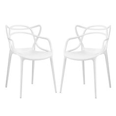 two white chairs sitting next to each other