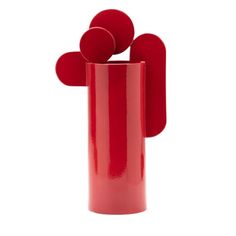 a red vase with three circles in it on a white background and the top half is empty