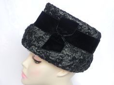 "Please measure your head to be sure the hat will fit. There are no returns!  Lovely black cello weave cloche hat adorned with a black velvet ribbon surrounding the crown and a small vertical bow on the left side. No brand name. Interior circumference measures 22\". Very lightly soiled at the inside front rim. The vertical bow is frayed at the edges. Some fraying of the cello weave. Good Condition" Chic Adjustable Black Cloche Hat, Classic Black Adjustable Cloche Hat, Luxury Elegant Black Cloche Hat, Black Cello, Vintage Black Cloche Hat With Curved Brim, Black Vintage Cloche Hat, Formal Hat, Black Velvet Ribbon, Dress Hat