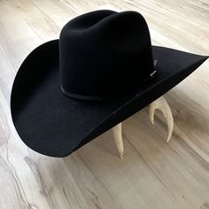 Ariat 6x Hat Black Rabbit Fur 2 Cord Black Band Genuine Sheepskin Sweatband Red Italian Silk Lining Made In The Usa Crown: 4-3/8 Brim: 4-1/4 A Cowboy Has To Have A Great Hat To Be Complete. You Will Love This Ariat 6x Rabbit Fur Hat By M & F Western Products. It Is Complete With 2 Cord Black Band And An Ariat Hat Pin. The Unbeatable Quality And Durability Of This Hat Are Perfect For When You Want To Get Dressed Up, Or Just Hanging Out At The Barn. Treat Yourself Today To This Nice Hat. Men's Cowboy Hats With Matching Boots, Cowboy Boots For Men Boot Barn, Felt Black Hat, Luxury Black Cowboy Hat, Cowboy Hat Black Felt, Coboy Hats, Rabbit Felt Hat, Ariat Hats, Halloween Costume Boots