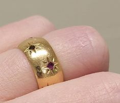 This beautiful Art deco ring displays starbursts of red, sparkling rubies. In excellent condition. Set in solid 14kt Yellow Gold. Would make a beautiful wedding band...especially for that July baby! Victorian Rings Vintage, Starburst Ring, Baguette Diamond Band, Beautiful Wedding Bands, Ring Inspiration, Insurance Claim, Gold Starburst, July Baby, Vintage Gold Rings