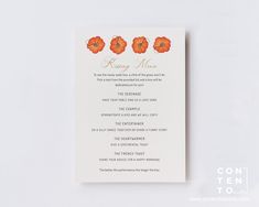 an orange and white wedding ceremony program with flowers on it's back side, sitting on a table