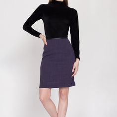 Vintage 90s high waisted purple mini pencil skirt, with faux black leather trim at the waistline. Measurements and Condition:    Fits like: Women's small Fabric: Feels like a polyester blend with faux leather trim Brand: Unknown, the tag was cut out by a previous owner Condition: Very good, with a couple tiny snags on the lower back.   Length: 20.25" Waist: 26" Hips: 36" - taken at the bottom of the zipper opening Shown on a 5'9" model with measurements of 33"-24"-37", usually wears size XS to s Fitted Pencil Skirt Skort For Fall, Fitted Pencil Skort For Fall, Fall Workwear Knee-length Skort, Fitted Pencil Mini Skirt For Fall, Fitted Pencil Skirt For Office In Winter, Winter Office Mini Pencil Skirt, Winter Workwear Mini Pencil Skirt, Winter Mini Pencil Skirt, Fitted Black Pencil Skirt For Business