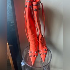 Balenciaga Cagole Boot Neon Orange Size 37 My Fav Boot But Ready To Get Another Color & Give These Babies Up To A Fashion Girly ! Some Wear On The Heel & Front Of Shoe But Nothing A Shoe Cobbler Can’t Fix Quickly . Def Worth The Buy . Very Comfortable. Balenciaga "Cagole" Knee Boots In Buckle, Stud And Zipper Embellished Lambskin Leather 3.50 In / 90 Mm Stiletto Heel Pointed Toe Side Zip Eases Dress Smooth Sole Made In Italy All Items Are 100% Authentic Designer Spring Boots, Shoe Cobbler, Orange Boots, Fashion Girly, Neon Orange, Cobbler, Lambskin Leather, Stiletto Heel, Shoes Heels Boots