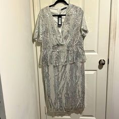 Silver Sequined Dress With Back Split. Never Worn. Has Tags Attached. Special Occasion. Knee-Length. Sequined Dress, Special Occasion Dress, Prom Wedding, Special Occasion Dresses, Sequin Dress, Knee Length, Special Occasion, Split, Prom Dresses