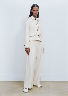 Tailored Cream Outerwear With Hidden Buttons, Off White Long Sleeve Blazer For Work, Chic Off White Outerwear For Work, Tailored Winter White Outerwear For Work, Chic Cream Outerwear With Button Cuffs, Cream Blazer With Button Cuffs For Spring, Off White Long Sleeve Outerwear For Work, Spring Cream Blazer With Button Cuffs, Off White Blazer For Workwear In Fall