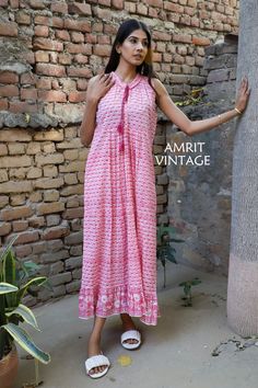 ITEM DESCRIPTION  indian pink botty pattern printed women's maxi dress - V neckline with tassels cotton long dress  Features: sleeve less, V neck, ruffle neck , Long dress Fabric: 100% Cotton cambric hand block printed fabrics   For more sizes & their measurement, please refer our below chart to understand the sizes variations available with us For your size requirement, please mention your size in seller note at the time of buying. SIZE MEASUREMENT  BUSTLENGTH XXS34 inch53 inch XS36 inch53 inch V-neck Block Print Maxi Dress For Vacation, Pink V-neck Maxi Dress With Vibrant Print, Festival Block Print V-neck Maxi Dress, Spring Paisley Print V-neck Maxi Dress, Bohemian Block Print V-neck Maxi Dress, Indian Pink, Cotton Long Dress, Women Maxi, Block Printing Fabric