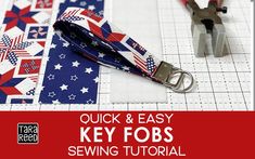 a pair of scissors sitting on top of a piece of fabric with the words quick and easy key fobs sewing