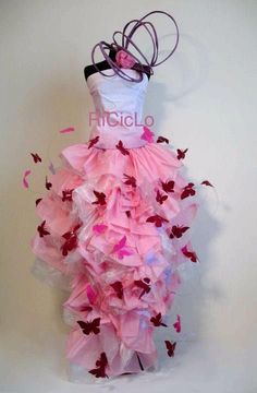 a dress made out of pink and red butterflies