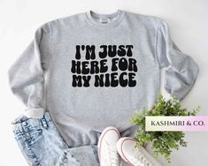 "A unisex \"I'M JUST HERE FOR MY NIECE\"  Comfy & Cute heavy blend crewneck sweatshirt. It's available in a variety of colors. Im Just Here For My Niece Sweatshirt, Gift For Aunt Sweater, Aunt Gift From Niece New Future Aunt, Funny Aunt Life Tia Gift Favorite Auntie For an Oversized Look order 1 to 2 sizes larger than your normal size. Features: These garments are made from polyester and cotton.  The collar is ribbed knit, so it retains its shape even after washing.  There are no itchy side seams on these sweaters.  🌟50% cotton, 50% polyester 🌟Medium-heavy fabric (8.0 oz/yd² (271.25 g/m 🌟 Runs true to size PLEASE SEE THE SIZING CHARTS for the measurements, and please consider comparing those measurements to a shirt that currently fits well. RETURNS: All products are made-to-order and be Gifts For Niece From Aunt Shirt, Functional Gifts For Aunts, Gifts For Aunt From Neice, Aunt To Niece Shirts, Gifts For Teen Niece From Aunt, Aunt Sweater, Aunt And Niece, Lily Grace, Gift For Aunt