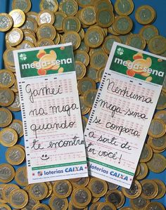 two coupons sitting on top of a pile of coins with spanish words written on them