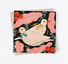 a greeting card with two birds on it