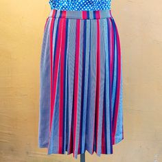 Vintage red, navy and white striped pleated midi skirt in excellent condition. Brand Creations Christian Marry Made in France Size and material tag removed Feels like nylon blend Fits women size L Elastic waist 38 cm = 15 inches hips open Length 62 cm = 24.4 inches Summer Workwear Skirt With Vertical Stripes, Striped Pleated Fitted Skirt, Casual Striped Pleated Bottoms, Striped Pleated Skirt For Work, Pleated Striped Skirt For Work, Knee-length Bottoms With Accordion Pleats For Summer, Summer Knee-length Bottoms With Accordion Pleats, Casual Striped Pleated Skirt, Striped Pleated Knee-length Skirt