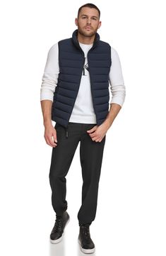 Whether you're deep in the backcountry or just your own backyard, you'll appreciate the cozy core warmth of this vest coated in a water-resistant finish. Front zip closure Stand collar Hidden side-zip pockets Water resistant Lined 100% polyester Machine wash, line dry Imported Sporty Puffer Vest For Outdoor Activities, Casual Waterproof Nylon Puffer Jacket, Casual Hiking Vest With Fleece Lining, Casual Nylon Hiking Vest, Casual Nylon Puffer Jacket For Hiking, Sleeveless Waterproof Outerwear For Outdoor Activities, Casual Waterproof Outdoor Vest, Casual Waterproof Vest For Outdoor Activities, Casual Waterproof Sleeveless Vest