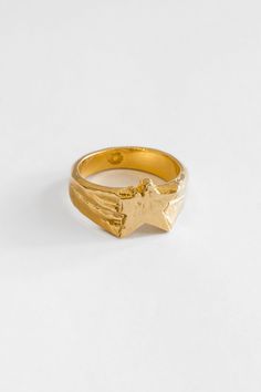 A rumination on bruised glory, the Asteria Ring conveys total agency. This feature signet combines a widening, angular band with a star face, characterised by a crumbling effect. Lightly hammered edges portray the careful workmanship channelled into each piece. The Asteria is unisex, designed to fit and suit you all.  Take a leaf out of the Merchants book and pair with the Link Chain. Star Face, Custom Signet Ring, Signature Fonts, Star Ring, Recycled Sterling Silver, Star Designs, Gold Style, Signet Ring, Silver Band