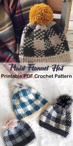 two knitted hats with pom poms on them