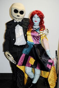 two people dressed up as jack and sally from the addams in halloween costumes, standing next to each other