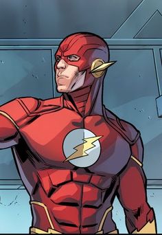 the flash standing in front of a window