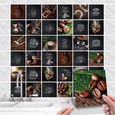 a person holding up a coffee poster in front of a wall with pictures of coffee beans