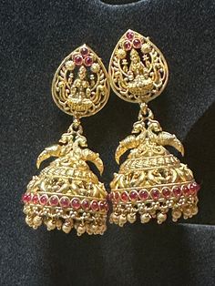 Elegant Antique finish Lakshmi jhumkas with push back stud to add more beauty to your traditional attire Please message, if you have any questions Note: Picture taken in natural light, so please allow some color variations due to screen resolution  Care Instruction : Avoid Heat & Chemicals Like Perfume, Deo, Alchol, Etc. | Clean With Dry Cotton Cloth Traditional Jhumkas With Pallu For Navratri, Festive Traditional Jhumkas For Puja, Festive Heavy Temple Jewelry Jhumkas, Heavy Temple Jewelry Style Jhumkas For Festive Occasions, Diwali Temple Jewelry Jhumkas With Latkans, Traditional Heavy Jhumkas For Navratri, Temple Style Jhumkas With Tilla For Festivals, Traditional Jhumkas For Puja And Diwali, Jhumkas With Pallu For Diwali Rituals