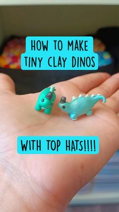 two tiny clay dinosaurs sitting on top of each other in someone's hand with the words how to make tiny clay dinos with top hats