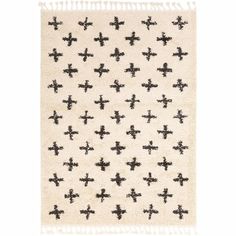 a white rug with black crosses on the front and back of it, against a white background