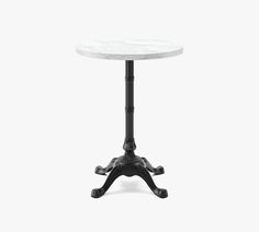 a small white table with black legs and a marble top, on a white background