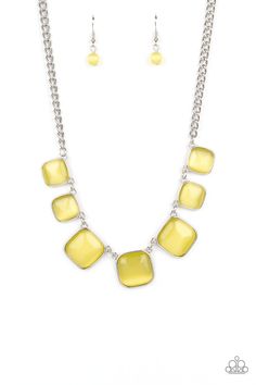 Encased in square silver fittings, a dewy collection of Illuminating cat's eye stones gradually increase in size as they link below the collar for a whimsical pop of color. Features an adjustable clasp closure. Sold as one individual necklace. Includes one pair of matching earrings. Cat Eye Necklace, Yellow Necklace, Yellow Jewelry, Cats Eye Stone, Yellow Cat, Paparazzi Accessories, Eye Stone, Paparazzi Jewelry, Green Necklace