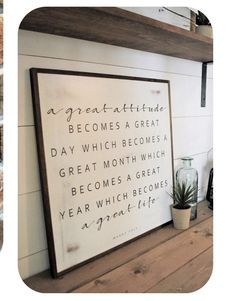 a wooden shelf with a sign on it that says, a great attitude becomes a great day which becomes a great month