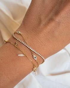 Sterling silver with 14k gold plating and cubic zirconia.Dimensions 6'' + 1'' extension Stacked Jewelry Bracelets, Dainty Bracelet Stack, Everyday Bracelets, Stacked Bracelets, Bracelet Evil Eye, Turkish Evil Eye, Everyday Bracelet, Bracelet Dainty