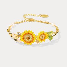 Be charmed by this exquisite Sunflower & Bee Bracelet, crafted from brass enamel for a timeless look and feel. Drawing on the romantic allure of the cottagecore aesthetic, this bracelet will become a treasured accessory to adorn your wrist with effortless grace. Add a touch of garden elegance to your look with the Sunflower & Bee Bracelet from Selenichast store. Detail Plating: 18K Gold Materials: 18K Gold on Brass, Enamel Size: Length: 6.30"(16cm)+Extender: 2.36"(6cm) Weight: 4.3g Hypoallergeni Bee Inspired Outfit, Sunflower And Bee, Bee Bracelet, Sunflower Bracelet, Cat Pendant Necklace, Sunflower Jewelry, Bee Inspired, Horses Pendant, Cat Pendants