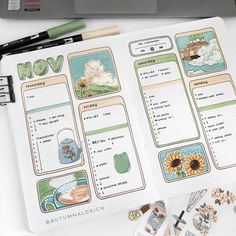 an open planner with stickers on it next to a laptop