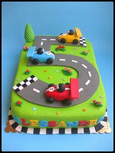 a birthday cake with cars on it