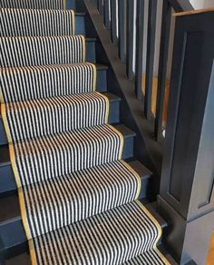 the stairs are striped with black and white stripes