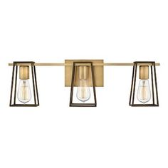 three light brass finish bathroom fixture with clear glass shades