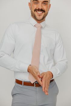 We pride ourselves in offering our customers some of the best skinny ties money can buy. Each DAZI tie is handmade from high quality imported fabrics. Features: Approx. 2.5" wide at the tip Approx. 58" in length 50% Cotton, 50% Linen Don't forget a matching pocket square! Shop our Mauve Pocket Square. Formal Cotton Tie, Formal Cotton Standard Tie Accessories, Dapper Fitted Standard Tie, Dapper Fitted Tie, Dapper Standard Tie, White Cotton Ties For Formal Occasions, Dapper Standard Tie Neckwear, Dapper Standard Tie For Work, Fitted Cotton Tie