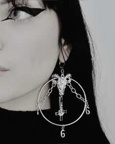 Goth style, gothic earrings, gothic baphomet jewelry, gothic accessories, goth accessory 

Stylish gothic hoop earrings to accessorize your dark side. 666 baphomet chain hoop earrings for goth girls Goth Aesthetic Jewelry, Gothic Hoop Earrings As A Gift, Goth Accessories Jewellery, Gothic Dangle Hoop Earrings, Gothic Nickel-free Hoop Jewelry, Baphomet Jewelry, Satanic Earrings, Satanic Jewelry, Accessories Goth