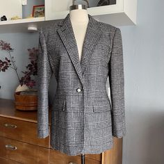 Ralph Lauren Houndstooth Plaid Blazer Jacket Navy Grey Equestrian Buttons  Size: 4 Chest: 38 1/2" Length: 29" Sleeve: 23 1/4" Front Single button closure  Buttons on sleeve ends  Pockets Padded shoulders  100% Wool Lined: acetate  Condition: Excellent.  No stains, rips or holes.  Pet free and smoke free home. Fitted Houndstooth Outerwear For Work, Fall Workwear Sport Coat With Houndstooth Pattern, Fall Houndstooth Sport Coat For Workwear, Fall Houndstooth Sport Coat For Work, Classic Houndstooth Sport Coat For Fall, Classic Fall Houndstooth Sport Coat, Fitted Plaid Sport Coat For Work, Navy Grey, Womens Blazers