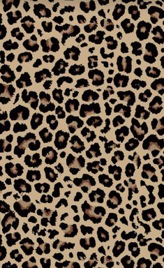 an animal print fabric with black and brown spots